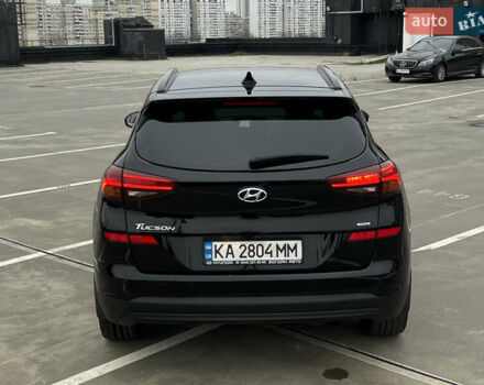 Чорний Хендай Туксон, об'ємом двигуна 2 л та пробігом 145 тис. км за 23900 $, фото 8 на Automoto.ua