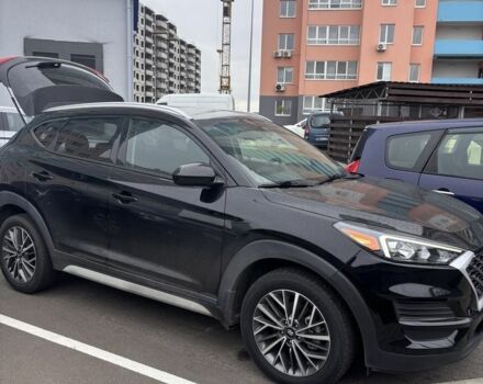 Черный Хендай Туксон, объемом двигателя 2.4 л и пробегом 140 тыс. км за 20000 $, фото 1 на Automoto.ua