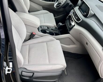 Черный Хендай Туксон, объемом двигателя 2.4 л и пробегом 147 тыс. км за 16400 $, фото 7 на Automoto.ua