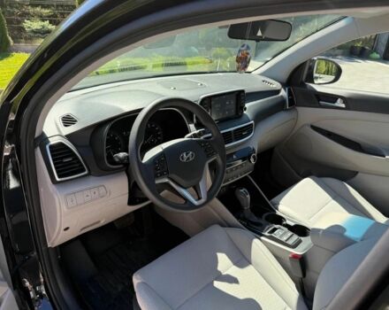 Черный Хендай Туксон, объемом двигателя 2 л и пробегом 80 тыс. км за 9500 $, фото 10 на Automoto.ua