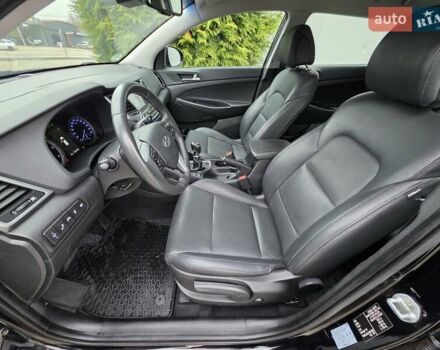 Черный Хендай Туксон, объемом двигателя 2 л и пробегом 151 тыс. км за 18950 $, фото 80 на Automoto.ua