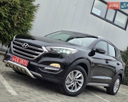 Черный Хендай Туксон, объемом двигателя 2 л и пробегом 151 тыс. км за 18950 $, фото 11 на Automoto.ua