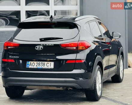 Чорний Хендай Туксон, об'ємом двигуна 2 л та пробігом 84 тис. км за 19000 $, фото 5 на Automoto.ua