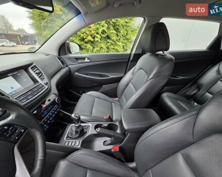 Черный Хендай Туксон, объемом двигателя 2 л и пробегом 151 тыс. км за 18950 $, фото 79 на Automoto.ua