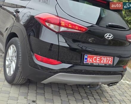 Черный Хендай Туксон, объемом двигателя 2 л и пробегом 151 тыс. км за 18950 $, фото 30 на Automoto.ua