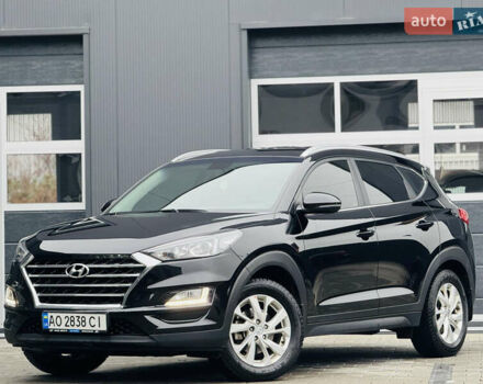 Чорний Хендай Туксон, об'ємом двигуна 2 л та пробігом 84 тис. км за 19000 $, фото 2 на Automoto.ua