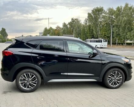 Черный Хендай Туксон, объемом двигателя 2.4 л и пробегом 147 тыс. км за 16400 $, фото 5 на Automoto.ua