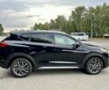 Черный Хендай Туксон, объемом двигателя 2.4 л и пробегом 147 тыс. км за 16400 $, фото 5 на Automoto.ua