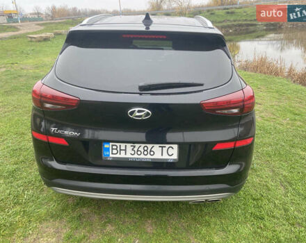 Черный Хендай Туксон, объемом двигателя 2.36 л и пробегом 68 тыс. км за 19000 $, фото 4 на Automoto.ua