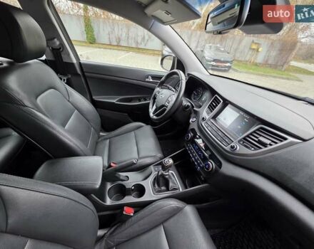 Черный Хендай Туксон, объемом двигателя 2 л и пробегом 151 тыс. км за 18950 $, фото 51 на Automoto.ua