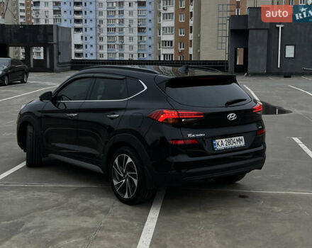 Чорний Хендай Туксон, об'ємом двигуна 2 л та пробігом 145 тис. км за 23900 $, фото 5 на Automoto.ua