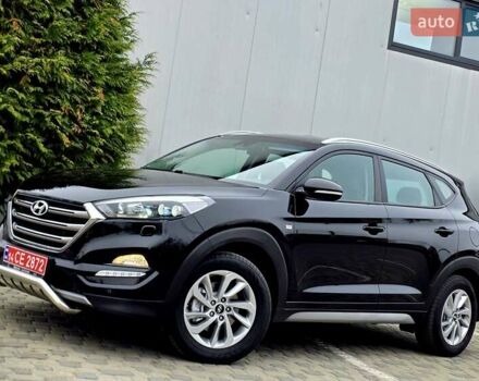 Черный Хендай Туксон, объемом двигателя 2 л и пробегом 151 тыс. км за 18950 $, фото 6 на Automoto.ua