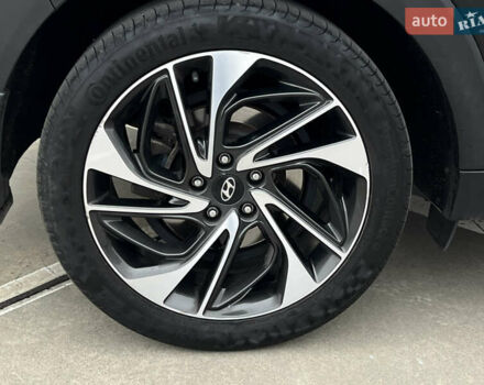 Чорний Хендай Туксон, об'ємом двигуна 2 л та пробігом 145 тис. км за 23900 $, фото 11 на Automoto.ua