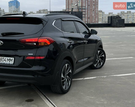Чорний Хендай Туксон, об'ємом двигуна 2 л та пробігом 145 тис. км за 23900 $, фото 9 на Automoto.ua