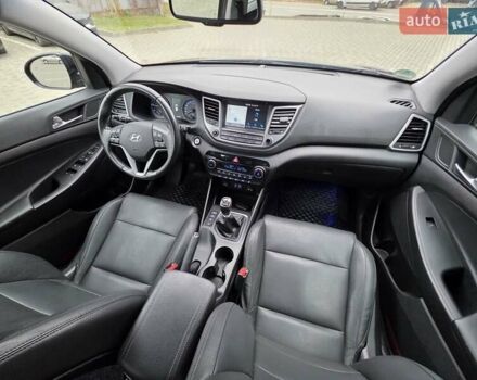 Черный Хендай Туксон, объемом двигателя 2 л и пробегом 151 тыс. км за 18950 $, фото 63 на Automoto.ua