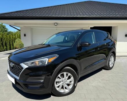 Черный Хендай Туксон, объемом двигателя 2 л и пробегом 80 тыс. км за 9500 $, фото 1 на Automoto.ua