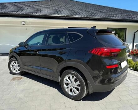 Черный Хендай Туксон, объемом двигателя 2 л и пробегом 80 тыс. км за 9500 $, фото 4 на Automoto.ua