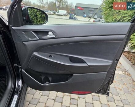 Черный Хендай Туксон, объемом двигателя 2 л и пробегом 151 тыс. км за 18950 $, фото 48 на Automoto.ua