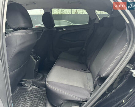 Чорний Хендай Туксон, об'ємом двигуна 2 л та пробігом 84 тис. км за 19000 $, фото 30 на Automoto.ua