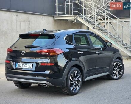 Черный Хендай Туксон, объемом двигателя 2 л и пробегом 108 тыс. км за 25500 $, фото 4 на Automoto.ua