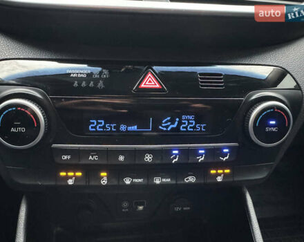 Чорний Хендай Туксон, об'ємом двигуна 2 л та пробігом 84 тис. км за 19000 $, фото 24 на Automoto.ua