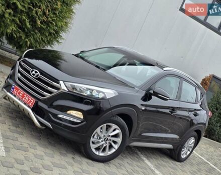 Черный Хендай Туксон, объемом двигателя 2 л и пробегом 151 тыс. км за 18950 $, фото 3 на Automoto.ua