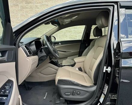 Черный Хендай Туксон, объемом двигателя 2.4 л и пробегом 42 тыс. км за 4100 $, фото 9 на Automoto.ua