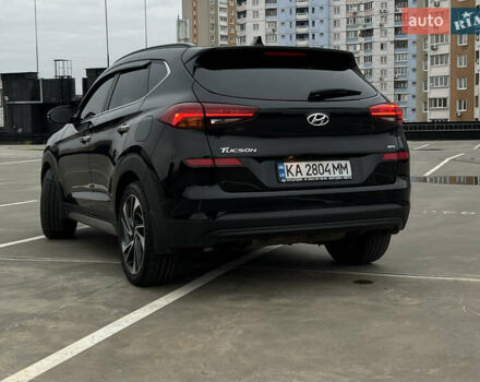 Чорний Хендай Туксон, об'ємом двигуна 2 л та пробігом 145 тис. км за 23900 $, фото 6 на Automoto.ua