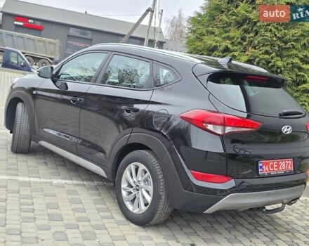 Черный Хендай Туксон, объемом двигателя 2 л и пробегом 151 тыс. км за 18950 $, фото 31 на Automoto.ua