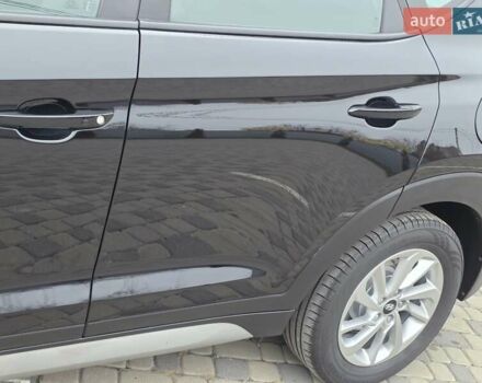 Черный Хендай Туксон, объемом двигателя 2 л и пробегом 151 тыс. км за 18950 $, фото 25 на Automoto.ua