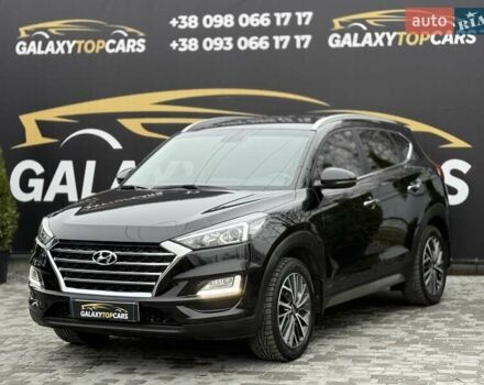 Черный Хендай Туксон, объемом двигателя 2 л и пробегом 55 тыс. км за 22300 $, фото 2 на Automoto.ua