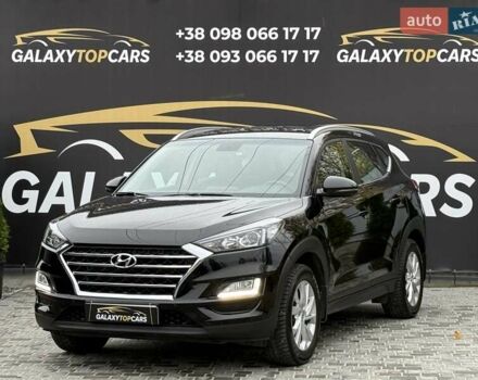 Черный Хендай Туксон, объемом двигателя 2 л и пробегом 77 тыс. км за 21500 $, фото 12 на Automoto.ua