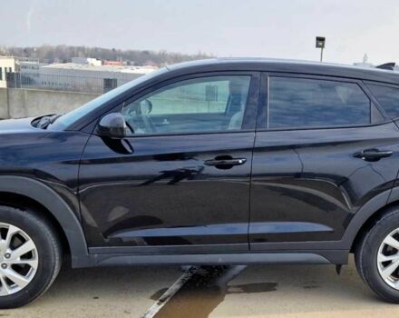 Черный Хендай Туксон, объемом двигателя 2 л и пробегом 76 тыс. км за 11200 $, фото 7 на Automoto.ua