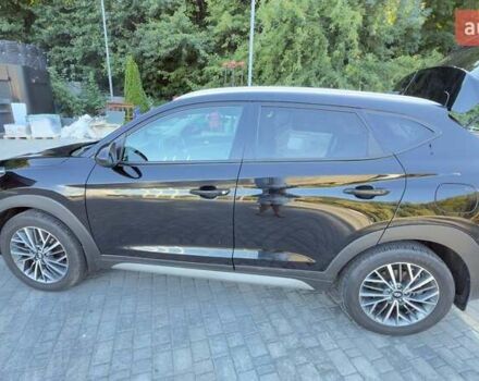 Черный Хендай Туксон, объемом двигателя 2.4 л и пробегом 69 тыс. км за 22000 $, фото 1 на Automoto.ua