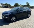 Черный Хендай Туксон, объемом двигателя 2 л и пробегом 76 тыс. км за 22000 $, фото 1 на Automoto.ua