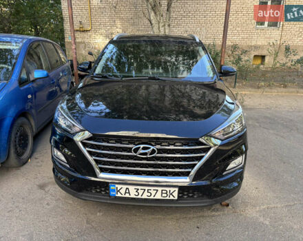 Черный Хендай Туксон, объемом двигателя 2 л и пробегом 74 тыс. км за 22600 $, фото 1 на Automoto.ua