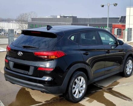 Черный Хендай Туксон, объемом двигателя 2 л и пробегом 76 тыс. км за 11200 $, фото 3 на Automoto.ua