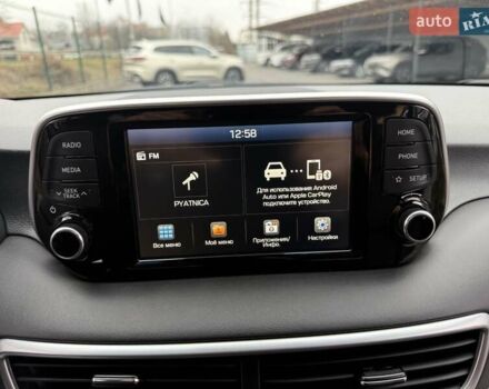 Черный Хендай Туксон, объемом двигателя 2 л и пробегом 55 тыс. км за 22300 $, фото 40 на Automoto.ua