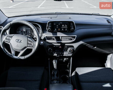 Черный Хендай Туксон, объемом двигателя 2 л и пробегом 88 тыс. км за 23000 $, фото 16 на Automoto.ua