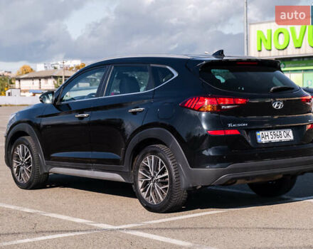 Черный Хендай Туксон, объемом двигателя 2 л и пробегом 88 тыс. км за 23000 $, фото 6 на Automoto.ua