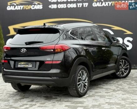 Черный Хендай Туксон, объемом двигателя 2 л и пробегом 55 тыс. км за 22300 $, фото 22 на Automoto.ua