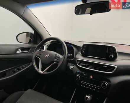 Черный Хендай Туксон, объемом двигателя 2 л и пробегом 100 тыс. км за 22424 $, фото 11 на Automoto.ua