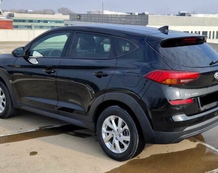 Черный Хендай Туксон, объемом двигателя 2 л и пробегом 76 тыс. км за 11200 $, фото 1 на Automoto.ua
