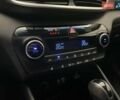 Черный Хендай Туксон, объемом двигателя 2 л и пробегом 100 тыс. км за 22424 $, фото 19 на Automoto.ua