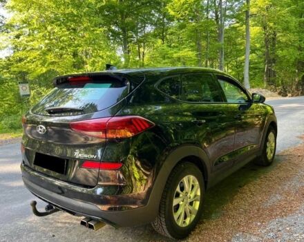 Черный Хендай Туксон, объемом двигателя 2 л и пробегом 89 тыс. км за 12400 $, фото 1 на Automoto.ua