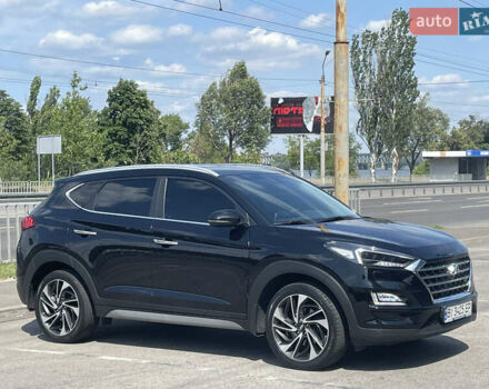 Чорний Хендай Туксон, об'ємом двигуна 2 л та пробігом 67 тис. км за 23700 $, фото 2 на Automoto.ua