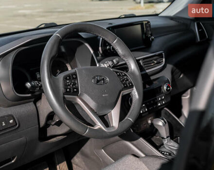 Черный Хендай Туксон, объемом двигателя 2 л и пробегом 88 тыс. км за 23000 $, фото 13 на Automoto.ua