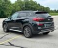 Чорний Хендай Туксон, об'ємом двигуна 2.4 л та пробігом 42 тис. км за 13100 $, фото 2 на Automoto.ua
