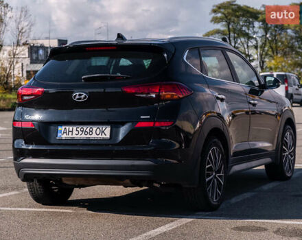 Черный Хендай Туксон, объемом двигателя 2 л и пробегом 88 тыс. км за 23000 $, фото 7 на Automoto.ua