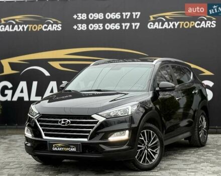 Черный Хендай Туксон, объемом двигателя 2 л и пробегом 55 тыс. км за 22300 $, фото 3 на Automoto.ua